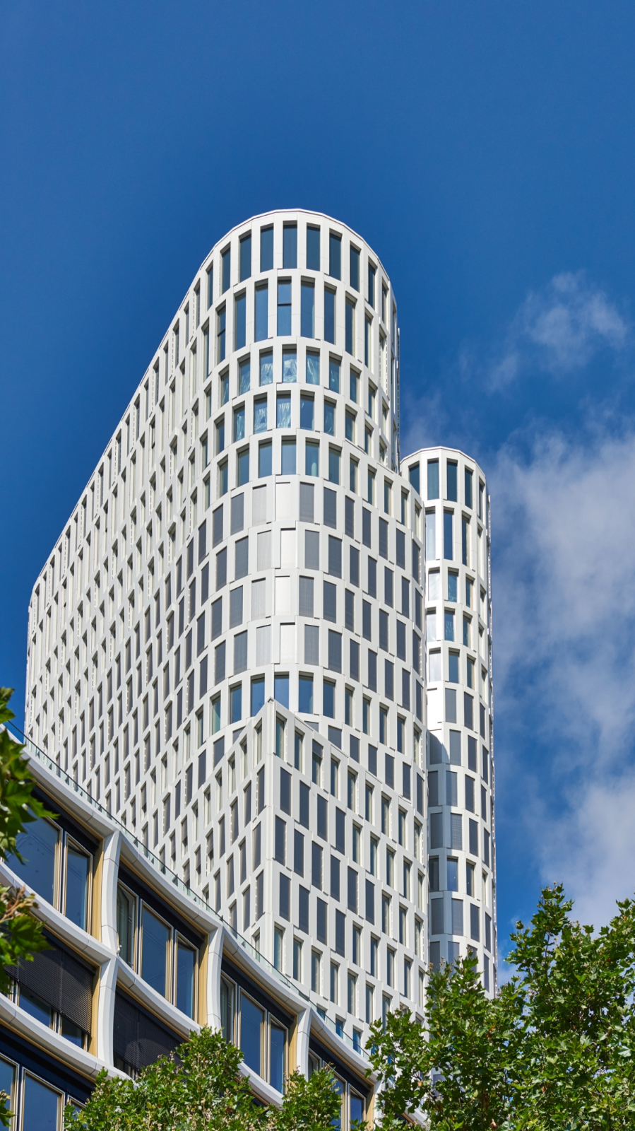 Curved limestone façade against sky